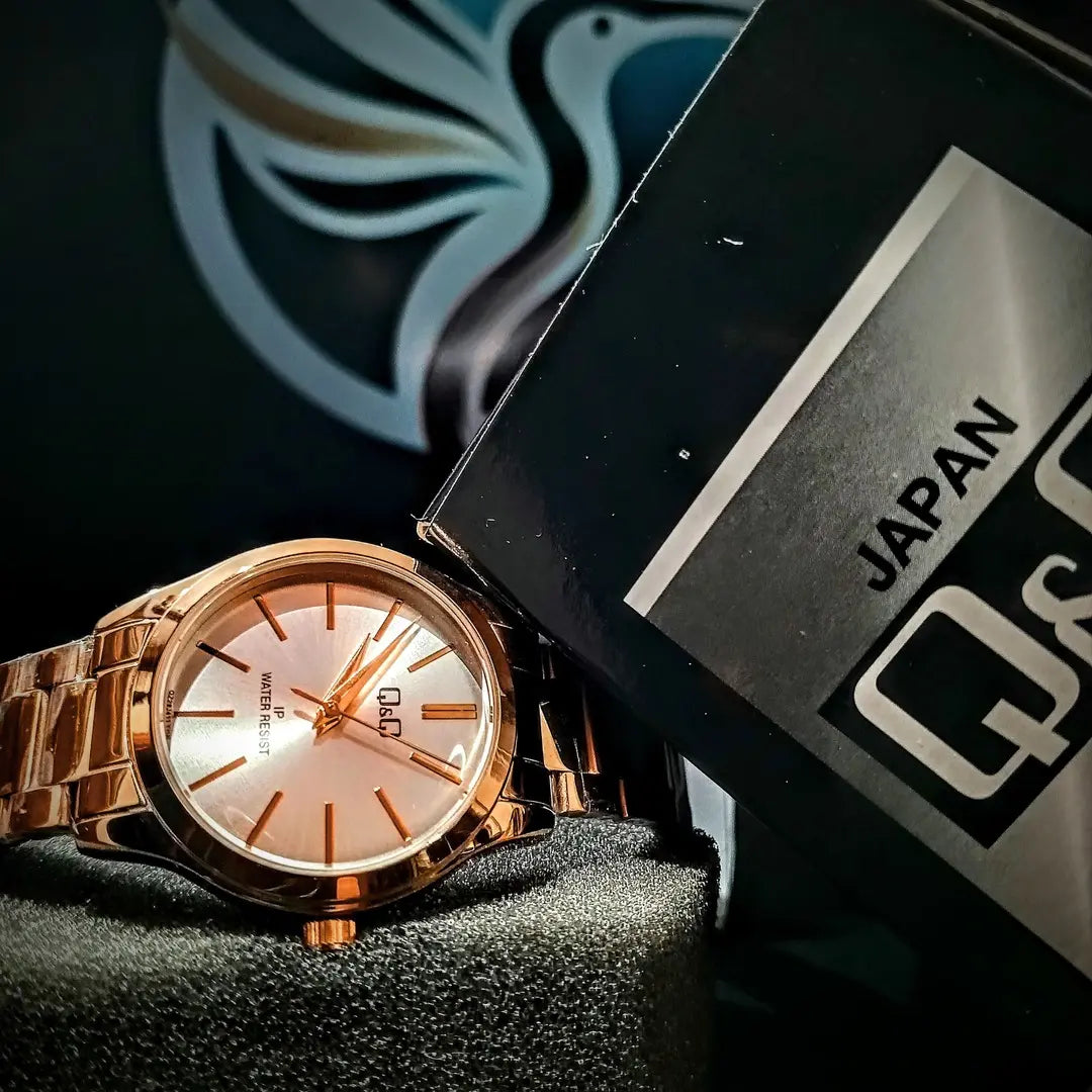 Reloj QyQ Dama clásico oro rosa acero inoxidable resistente al agua - Emma Home Store