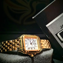 Reloj QyQ Dama vintage dorado en acero inoxidable con números romanos