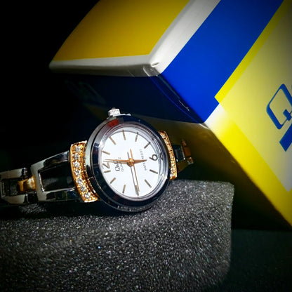 Reloj QyQ Dama plateado y dorado en acero inoxidable Ref. E573-802 - Emma Home Store