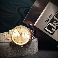 Reloj QyQ Dama bicolor fondo dorado en acero inoxidable Resistente al agua