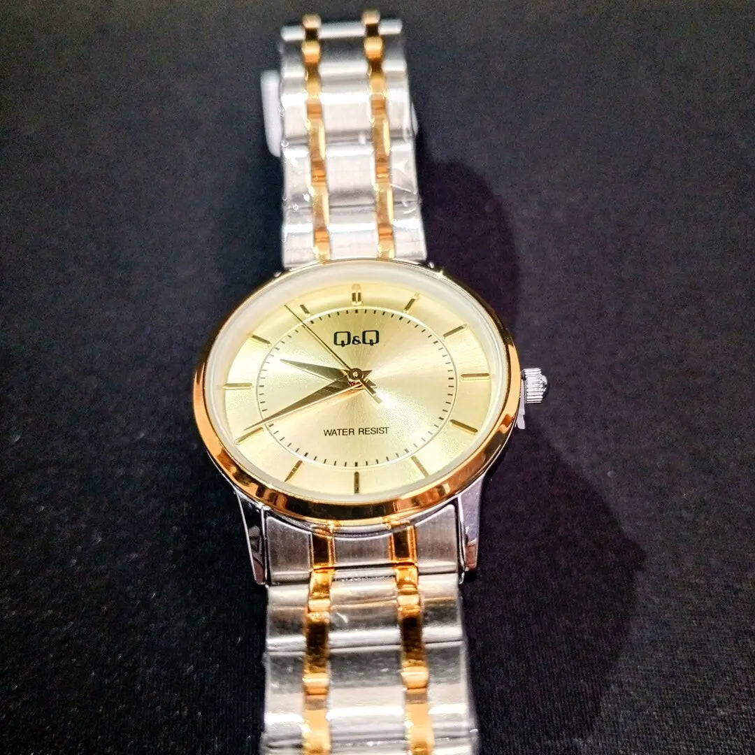 Reloj QyQ Dama bicolor fondo dorado en acero inoxidable Resistente al agua - Emma Home Store