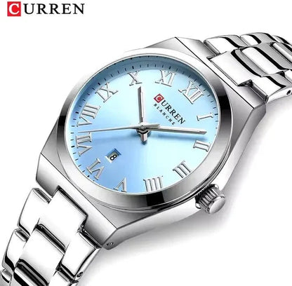 Reloj Curren Plateado y Celeste para dama Ref. 9095